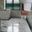 badkamer wit marmer met blokje en kader verde india